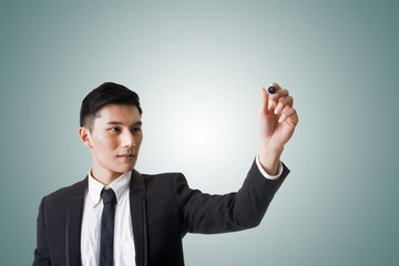 businessman writing or drawing