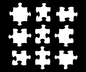 Nine blank jigsaw pieces