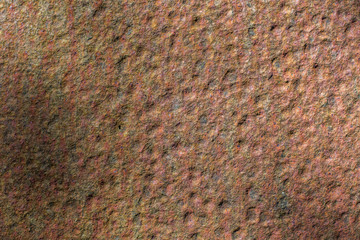 dimpled rusted metal sheet - clearwell caves, monmouthshire