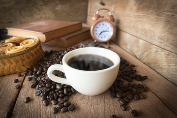cup of coffee on wood backgound