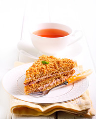 Honey layered cake with strawberry cream