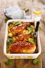 Baked chicken with rice and mango glaze
