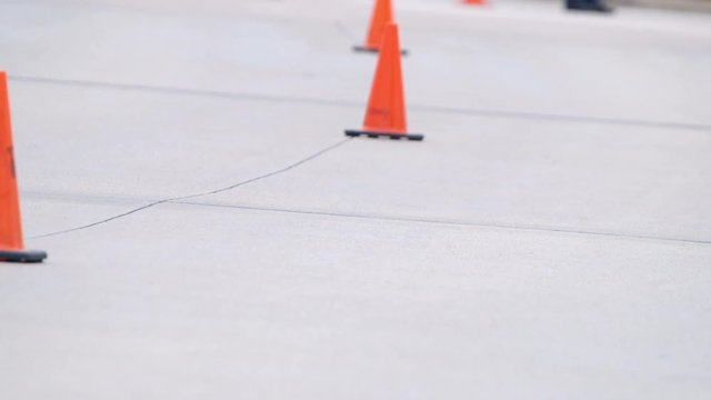 Bicyclists race by as part of the second event of a triathlon.