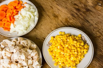 vegetables and boiled chicken fillet on the table