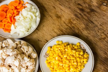 vegetables and boiled chicken fillet on the table