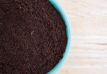 Kona coffee ground beans in a bowl