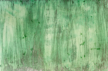Faded paint on a wooden surface.