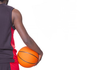 Back view of afro american basketball player holding a ball, iso