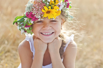 Beautiful kid with flower bunch