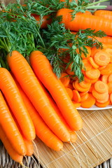Fresh carrots with green leaves