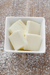 slice butter on the white bowl