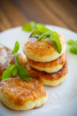 sweet cheese pancakes on a plate 
