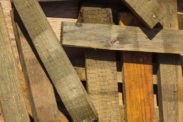 Junk piled up in a pile of old boards