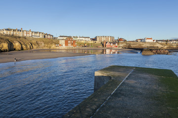 Obraz premium Early morning at Cullercoats Bay, North Tyneside, England, UK.