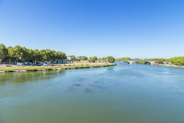Fototapeta na wymiar Avignon, France. View of the Rhone River and the waterfront