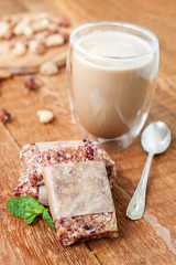 Granola bars and a glass of coffee