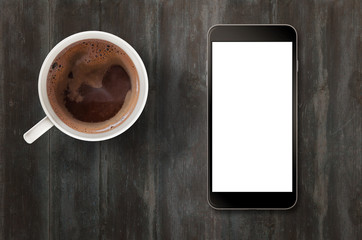 Fototapeta na wymiar Smart phone with isolated white display for mockup. Top view scene with coffee.