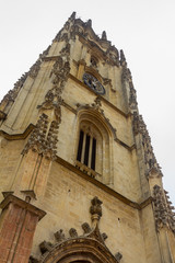 Fototapeta na wymiar Bell tower of Old Catholic Church in Spain
