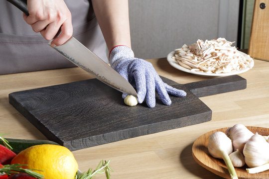 Japanese knife Cutting garlic on a cutting board
