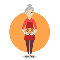 Grandma with sweet pie in her hands.