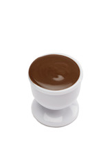 a bowl of chocolate syrup