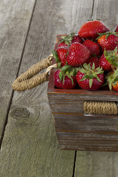 cropped image of strawberries in box.