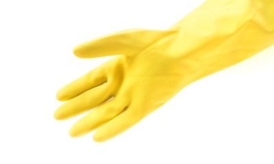 Hand wearing yellow rubber gloves for cleaning on white background, workhouse concept