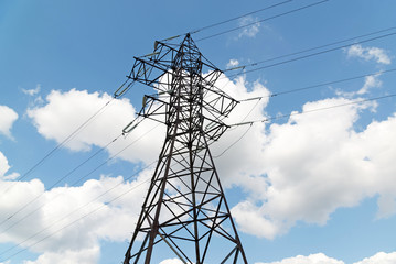 High-voltage power line on sky background