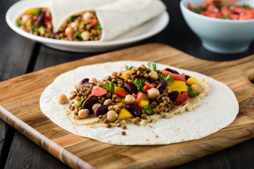 Vegan wraps with lentil, chickpea peppers and kidney bean