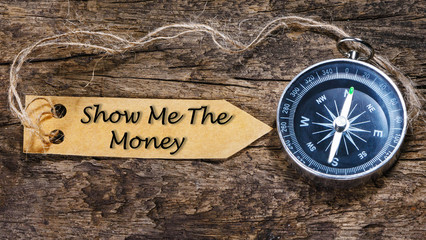 Show me the money - business tips handwriting on label with comp
