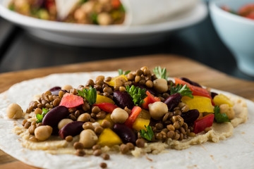 Vegan wraps with lentil, chickpea peppers and kidney bean
