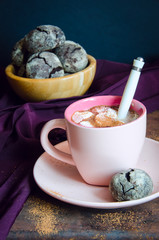 Hot chocolate in pink cup and shortbread