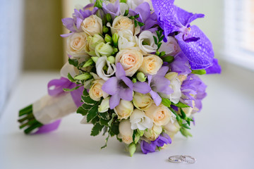 wedding bouquet and rings