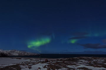 Colorful Northern Lights over starry night sky