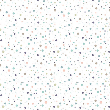 Cute seamless pattern or texture with colorful polka dots on white background.