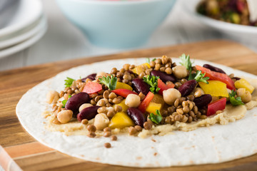 Vegan wraps with lentil, chickpea peppers and kidney bean