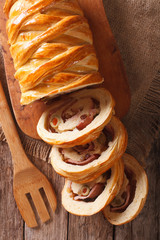 Venezuelan cuisine: Christmas loaf pan de jamon close-up. Vertical top view    © FomaA