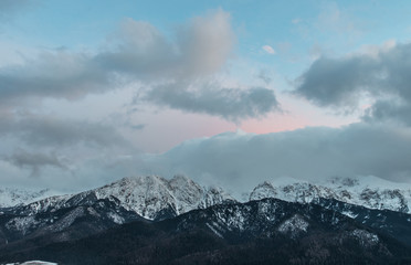 Obraz premium Winter Tatra mountains, Giewont peak in the evening