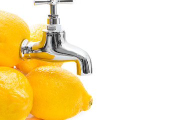 Conception of lemons with metal tap on white background.
