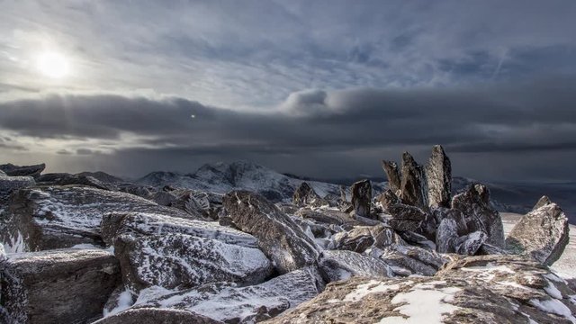 View from the top of Glyder Fawr in winter. Snowdonia National Park, Wales, United Kingdom - 4K Motion Timelapse