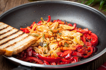 Fried chicken pieces with vegetables.