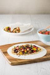 Vegan wraps with lentil, chickpea peppers and kidney bean