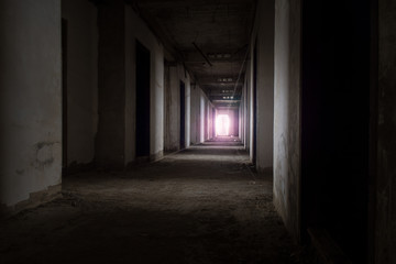Fototapeta premium Abandoned building / View of inside the abandoned building, Halloween background. Dark tone with violet light.