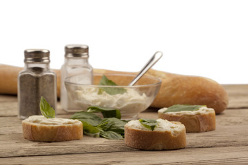 butter spread on baguette slices