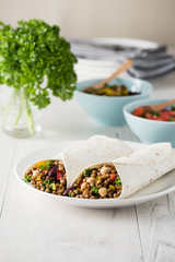 Vegan wraps with lentil, chickpea peppers and kidney bean