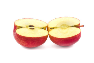 red apple devided on two halfs on a white background