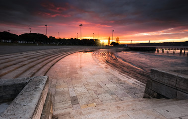 Fototapeta na wymiar Stairs to the sun, sunrise with cloudy sky at Lisbon (Lisboa)