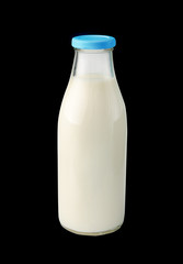 Traditional glass milk bottle isolated on black background with clipping path