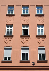 The wall of the city buildings in the center of a European city.