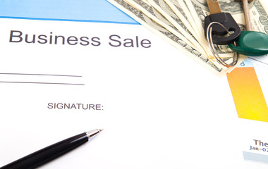 Signature contract on businessman table
